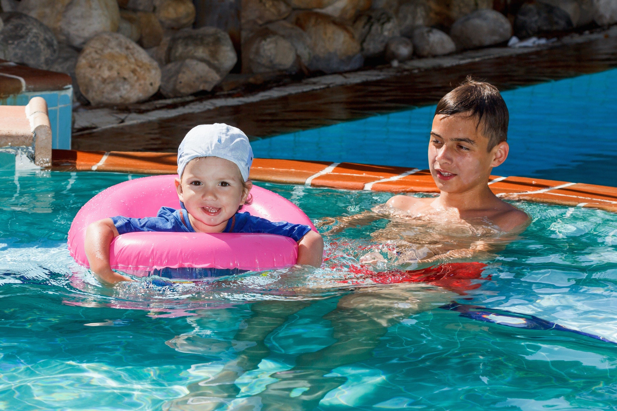 Two children in a pool