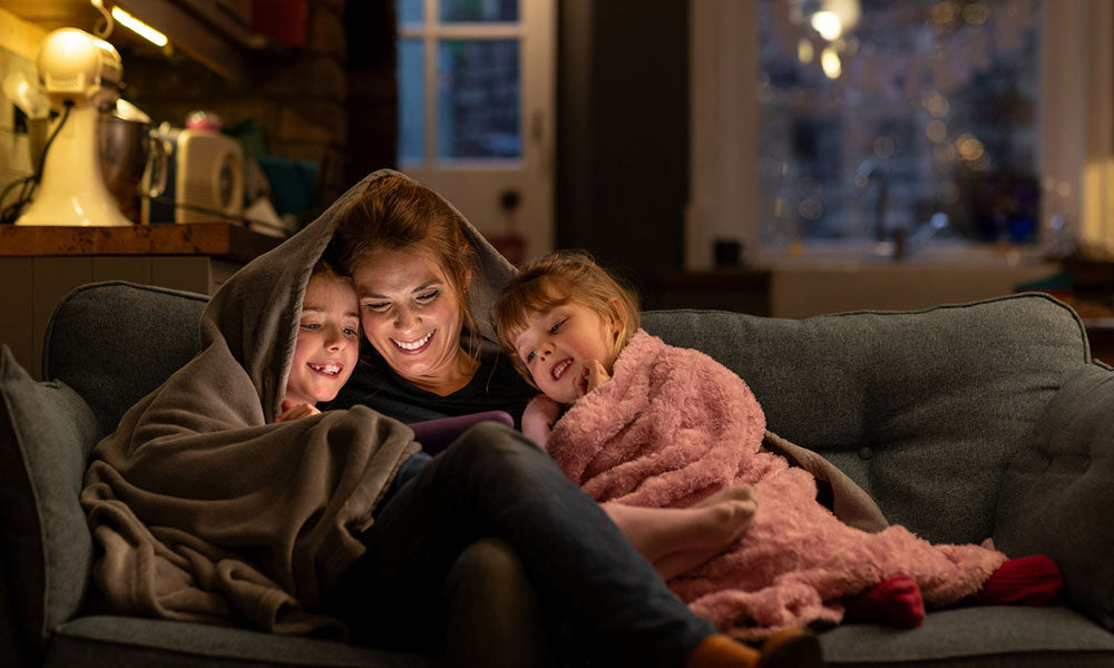 family looking at ipad