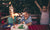 Excited young boy with birthday cake