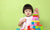 little girl playing with building blocks