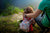 Rear view of a father and daughter looking far way