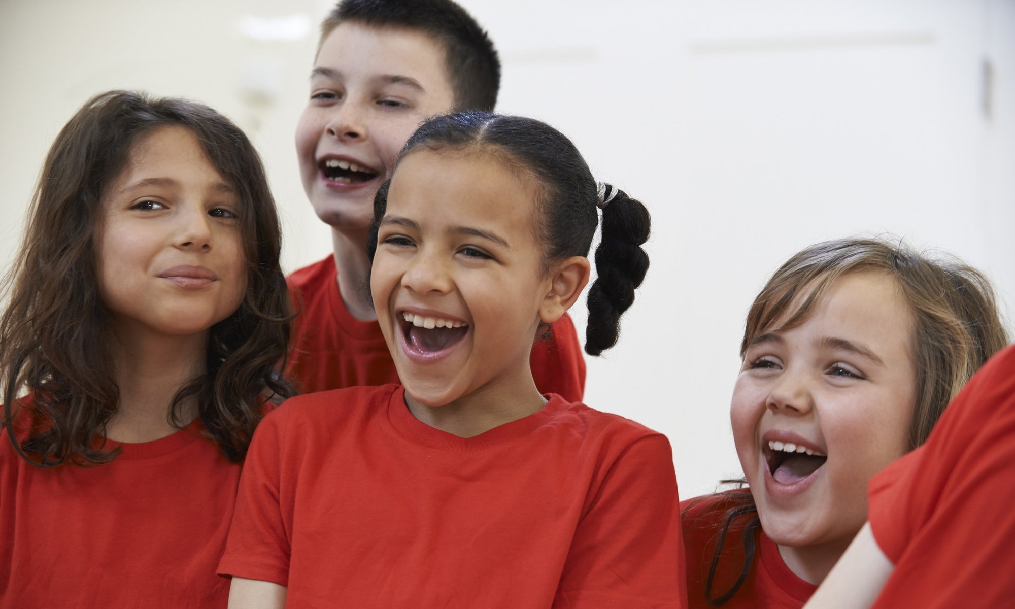 happy kids in red tshirt