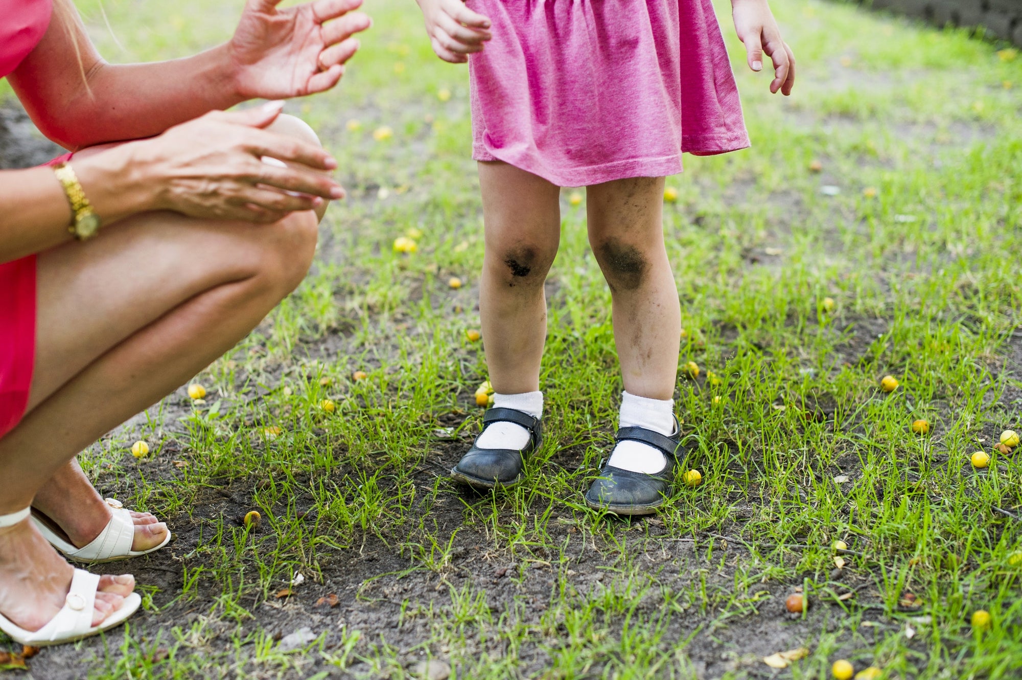 little baby girl legs with dirty knees