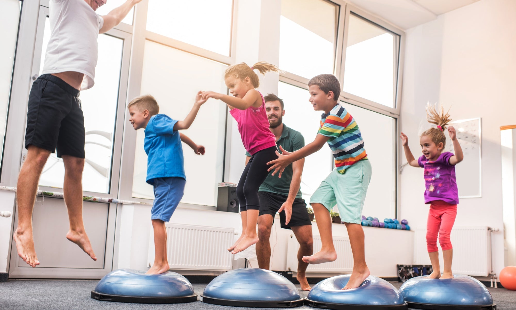 Childrens jumping on a studio