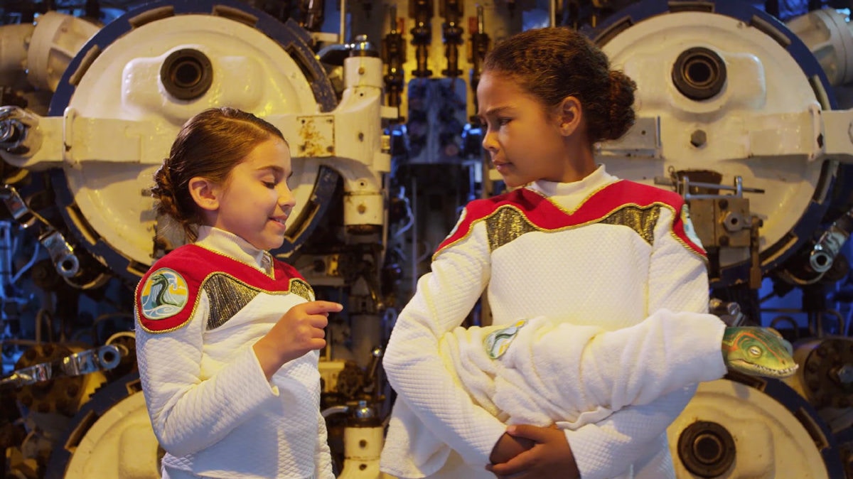 Two girls discussing each other by wearing magical dress