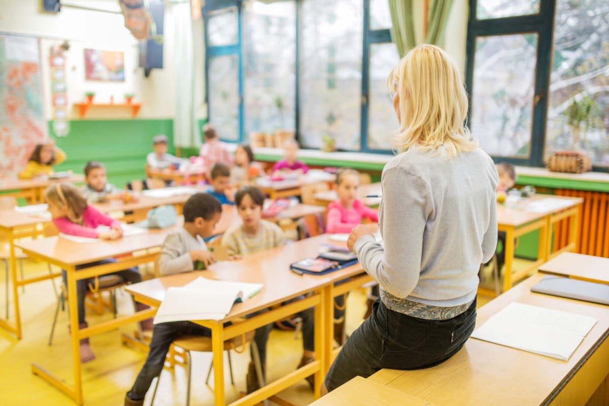 classroom with teacher and students