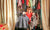 A child selecting dress from the closet