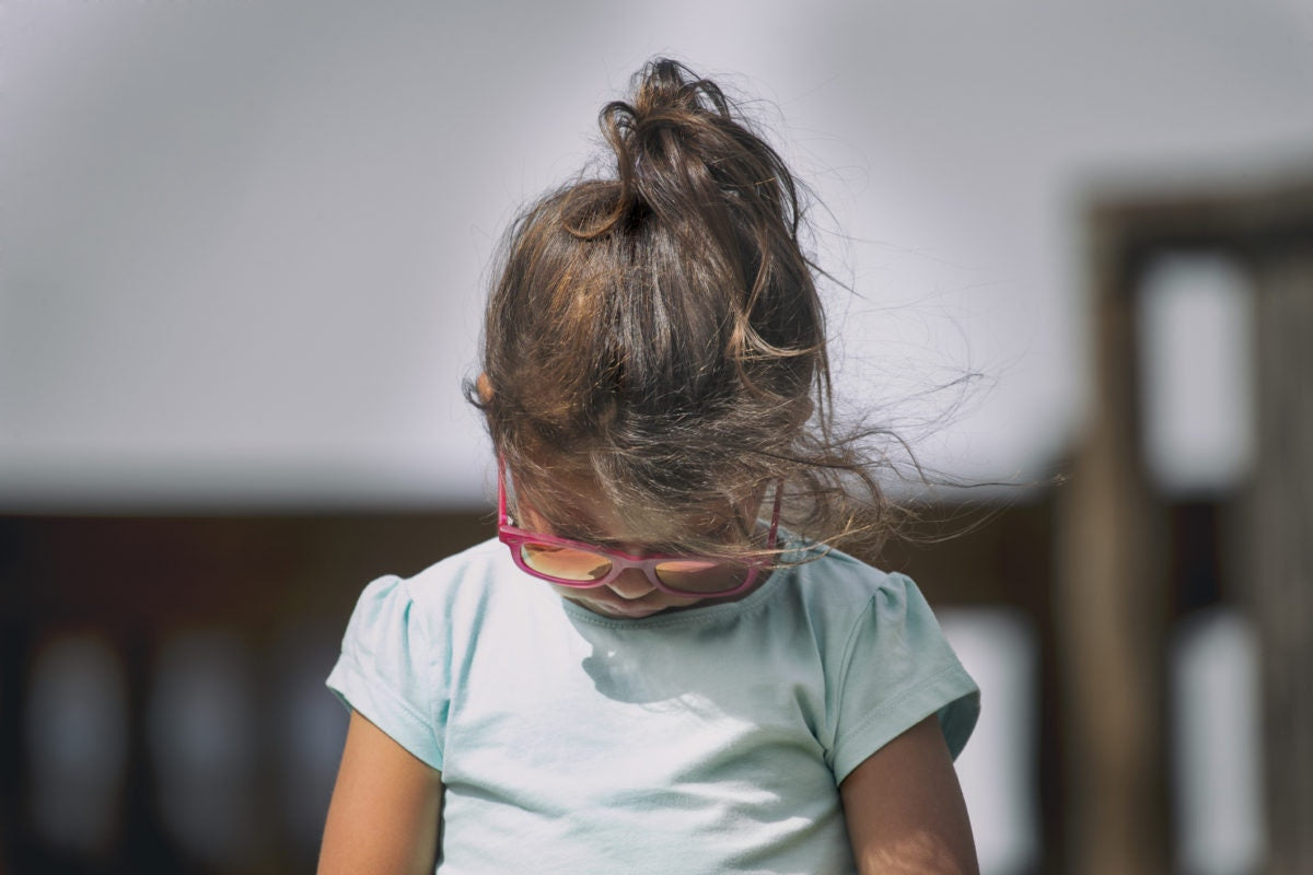 A girl wearing sun glasses