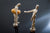 two wooden puppets on white background