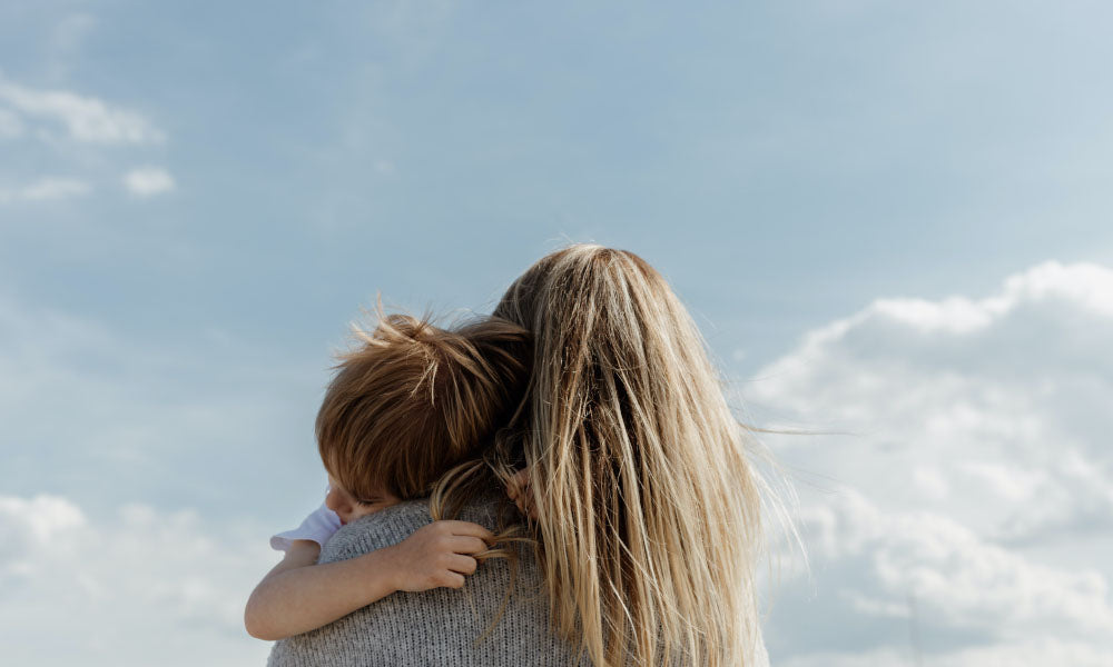 woman holding child